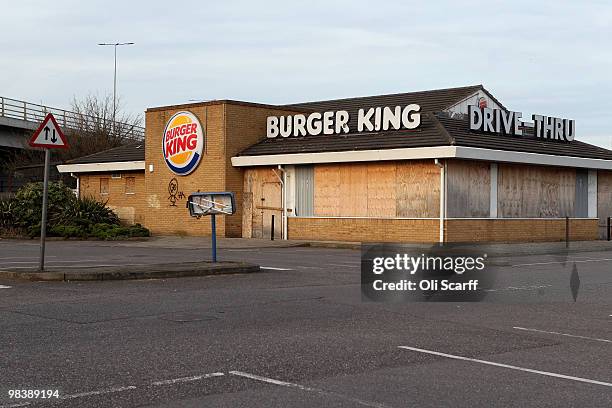 Former Burger King restaurant stands boarded-up in the borough of Barking and Dagenham on April 10, 2010 in London, England. Government figures from...