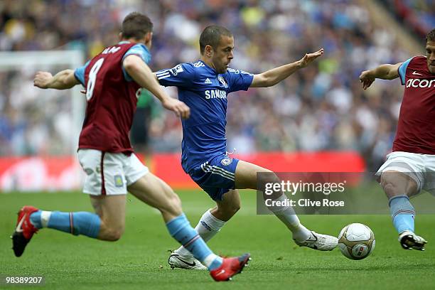 Joe Cole of Chelsea takes on the Aston Villa defence during the FA Cup sponsored by E.ON Semi Final match between Aston Villa and Chelsea at Wembley...