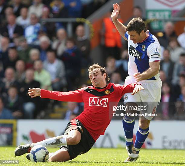 Dimitar Berbatov of Manchester United clashes with Ryan Nelsen of Blackburn Rovers during the FA Barclays Premier League match between Blackburn...