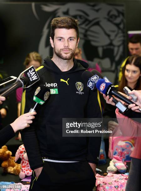 Trent Cotchin speaks after packing the Alannah & Madeline Foundations 85,000th Buddy Bag during a Richmond Tigers AFL media opportunity at Punt Road...