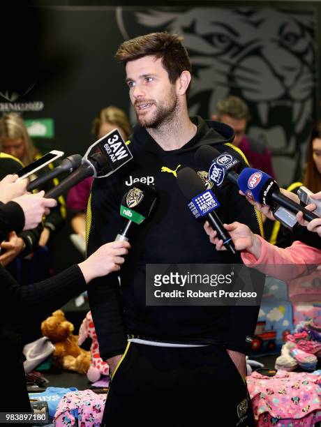 Trent Cotchin speaks after packing the Alannah & Madeline Foundations 85,000th Buddy Bag during a Richmond Tigers AFL media opportunity at Punt Road...