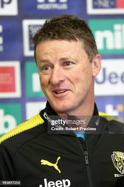 Coach Damien Hardwick speaks after packing the Alannah & Madeline Foundations 85,000th Buddy Bag during a Richmond Tigers AFL media opportunity at...