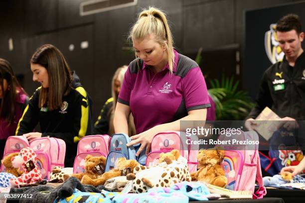 General view as Alannah & Madeline Foundations Buddy Bags are packed during a Richmond Tigers AFL media opportunity at Punt Road Oval on June 26,...