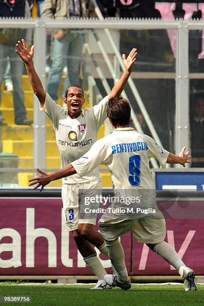 Marcos Ariel De Paula of Chievo celebrates with Simone Bentivoglio after scoring the opening goal during the Serie A match between US Citta di...