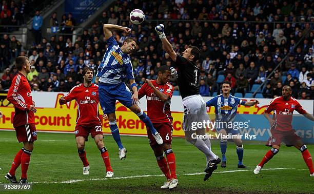 Goalkeeper Frank Rost of Hamburg makes a save in front of Stanislav Sestak of Bochum during the Bundesliga match between VfL Bochum and Hamburger SV...