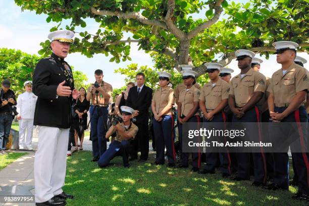 Marine Corps Lieutenant general Lawrence Nicholson speaks to officers at the Cornerstone of Peace where the names of their bereaved family members...