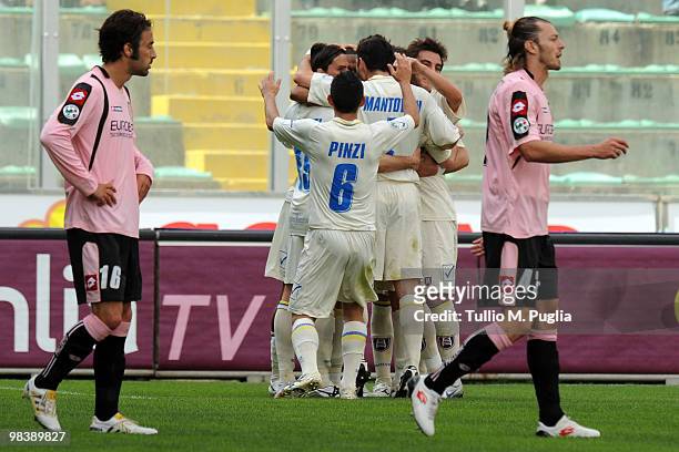 Chievo players celebrate the opening goal scored by Marcos Ariel De Paula during the Serie A match between US Citta di Palermo and AC Chievo Verona...