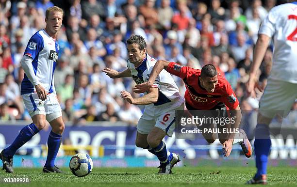 Manchester United's Italian forward Federico Macheda vies with Blackburn Rovers' New Zealand defender Ryan Nelsen during the English Premier League...