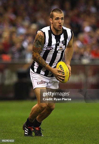 Dane Swan of the Magpies looks upfield during the round three AFL match between the St Kilda Saints and the Collingwood Magpies at Etihad Stadium on...