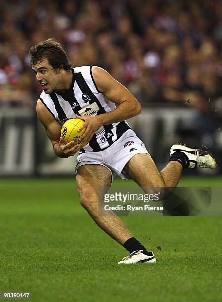 Steele Sidebottom of the Magpies runs with the ball during the round three AFL match between the St Kilda Saints and the Collingwood Magpies at...