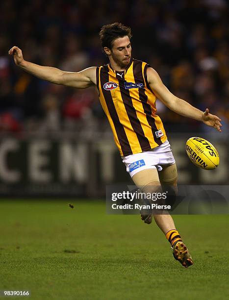 Garry Moss of the Hawks kicks during the round three AFL match between the Western Bulldogs and the Hawthorn Hawks at Etihad Stadium on April 11,...