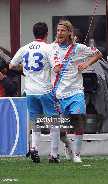 Maxi Lopez of Catania celebrates after scoring his first catania's goal during the Serie A match between AC Milan and Catania Calcio at Stadio...