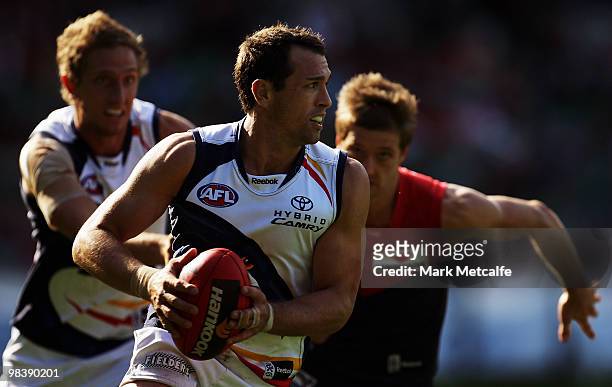 Michael Doughty of the Crows runs with the ball during the round three AFL match between the Melbourne Demons and the Adelaide Crows at Melbourne...