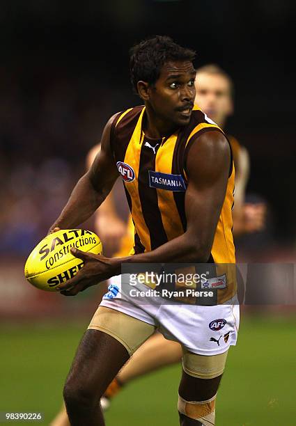 Carl Peterson of the Hawks looks upfield during the round three AFL match between the Western Bulldogs and the Hawthorn Hawks at Etihad Stadium on...