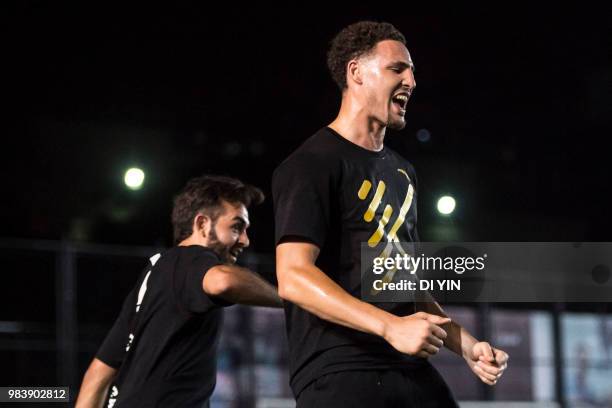 Player Klay Thompson of the Golden State Warriors celebrate a goal when he play soccer with his friends on June 24, 2018 in Beijing, China.