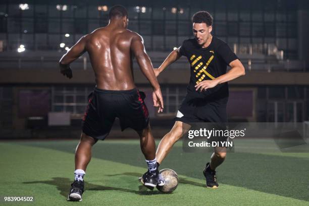 Player Klay Thompson of the Golden State Warriors play soccer with his friends on June 24, 2018 in Beijing, China.