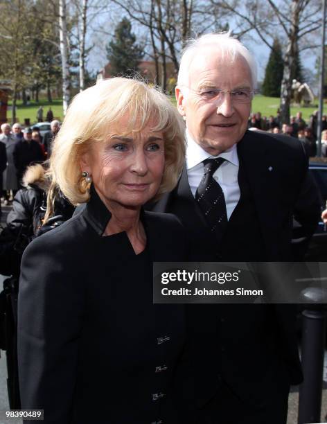 Former Bavarian state governor Edmund Stoiber and his wife Karin arrive for the funeral service for Wolfgang Wagner at festival opera house on April...