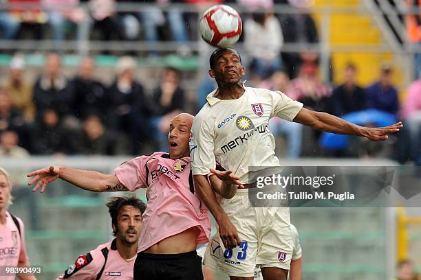 Giulio Migliaccio of Palermo and Marcos Ariel De Paula of Chievo compete for a header during the Serie A match between US Citta di Palermo and AC...