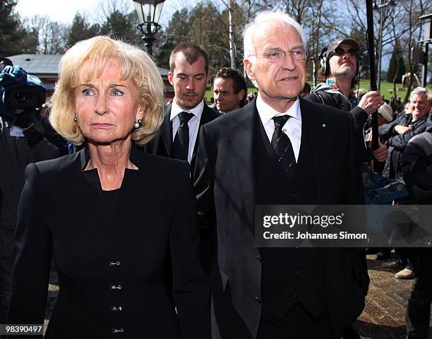 Former Bavarian state governor Edmund Stoiber and his wife Karin attend the funeral service for Wolfgang Wagner at festival opera house on April 11,...