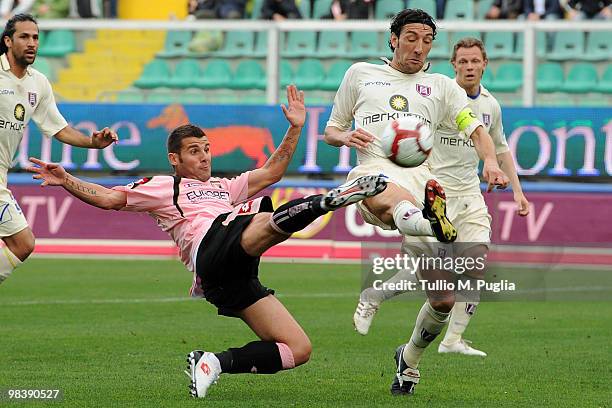 Antonio Nocerino of Palermo and Davide Mandelli of Chievo compete for the ball during the Serie A match between US Citta di Palermo and AC Chievo...