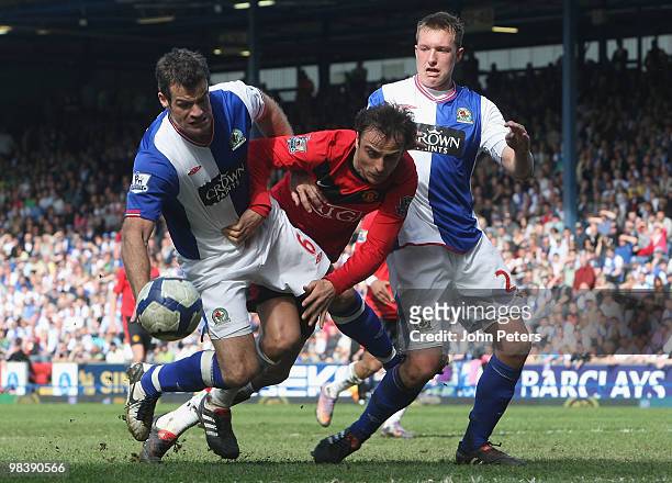 Dimitar Berbatov of Manchester United clashes with Ryan Nelsen and Phil Jones of Blackburn Rovers during the Barclays Premier League match between...