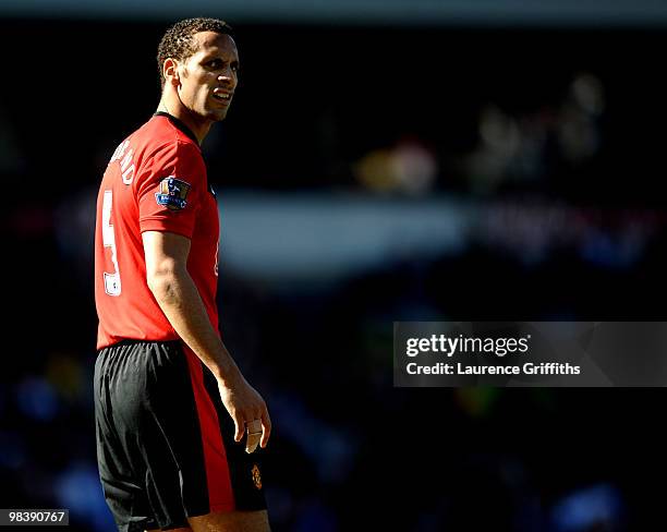 Rio Ferdinand of Manchester United looks dejected after dropping points in the Barclays Premier League Match between Blackburn Rovers and Manchester...