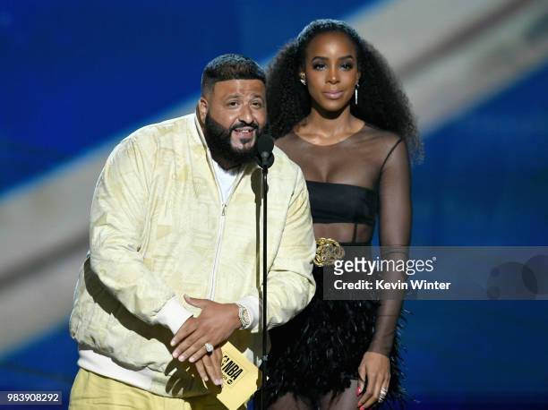 Khaled and Kelly Rowland speak onstage at the 2018 NBA Awards at Barkar Hangar on June 25, 2018 in Santa Monica, California.