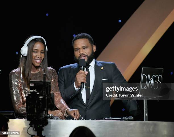 Kiss and Anthony Anderson speak onstage at the 2018 NBA Awards at Barkar Hangar on June 25, 2018 in Santa Monica, California.