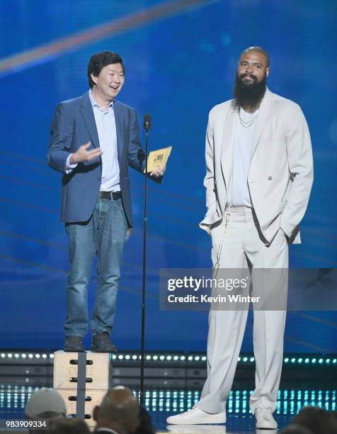 Ken Jeong and Tyson Chandler speak onstage at the 2018 NBA Awards at Barkar Hangar on June 25, 2018 in Santa Monica, California.