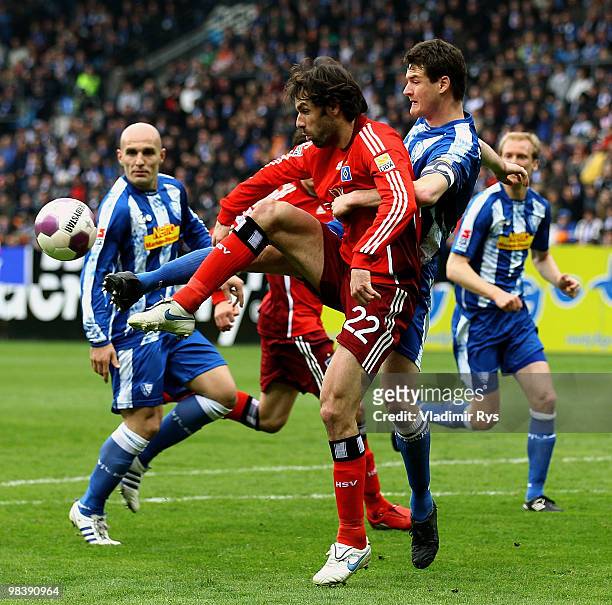 Ruud van Nistelrooy of Hamburg is covered by Marcel Maltritz of Bochum during the Bundesliga match between VfL Bochum and Hamburger SV at Rewirpower...