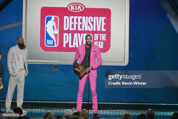 Defensive Player of the Year Rudy Gobert speaks onstage at the 2018 NBA Awards at Barkar Hangar on June 25, 2018 in Santa Monica, California.