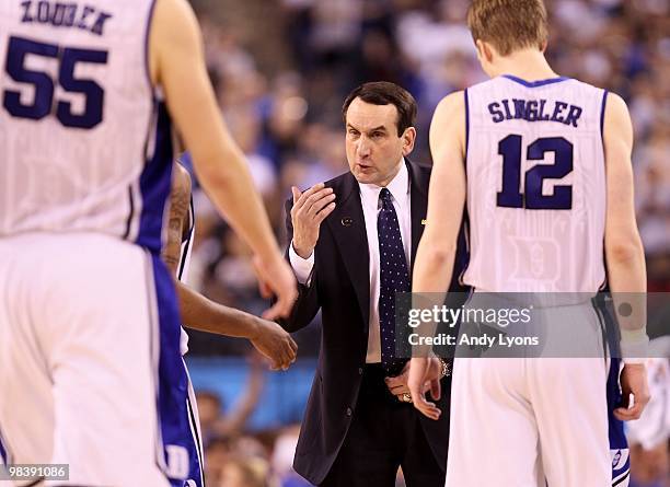 Head coach Mike Krzyzewski of the Duke Blue Devils gestures towards his players at a timeout against the Butler Bulldogs during the 2010 NCAA...