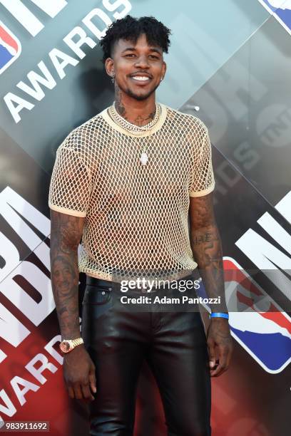 Nick Young of the Golden State Warriors walks the red carpet before the NBA Awards Show on June 25, 2018 at the Barker Hangar in Santa Monica,...