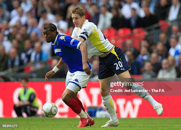 Michael Dawson of Tottenham Hotspur and Frederic Piquionne of Portsmouth battles for the ball during the FA Cup sponsored by E.ON Semi Final match...