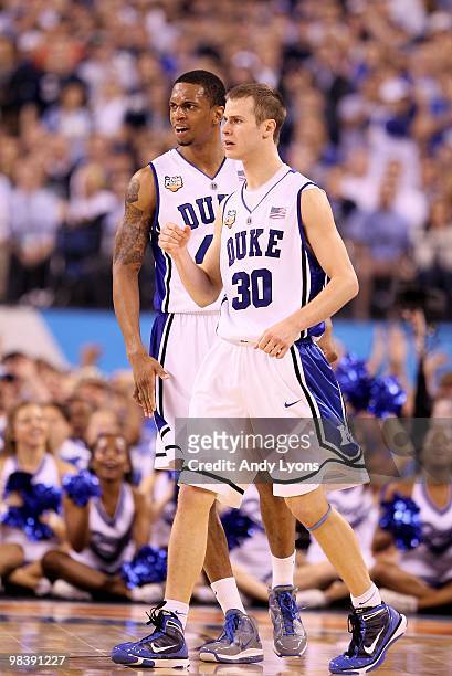 Lance Thomas and Jon Scheyer of the Duke Blue Devils react against the Butler Bulldogs during the 2010 NCAA Division I Men's Basketball National...