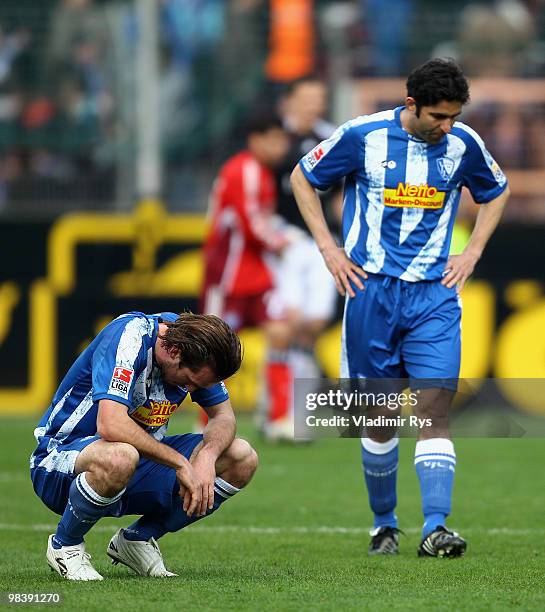 Christian Fuchs and his team mate Vahid Hashemian of Bochum look dejected after the Bundesliga match between VfL Bochum and Hamburger SV at...