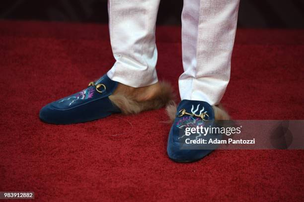 Slippers of Von Miller of the Denver Broncos walks the red carpet before the NBA Awards Show on June 25, 2018 at the Barker Hangar in Santa Monica,...