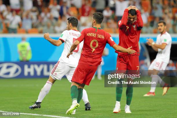 Cristiano Ronaldo of Portugal is consoled by Andre Silva after failing to convert a penalty during the 2018 FIFA World Cup Russia group B match...