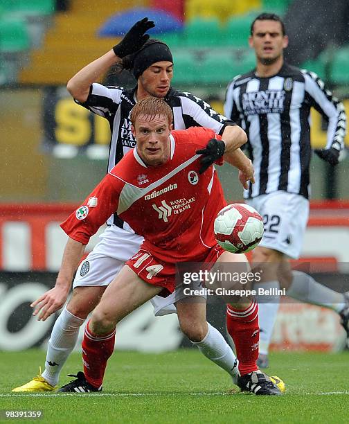 Marcelo Larrondo of Siena and Alessandro Gazzi of Bari in action during the Serie A match between AC Siena and AS Bari at Stadio Artemio Franchi on...