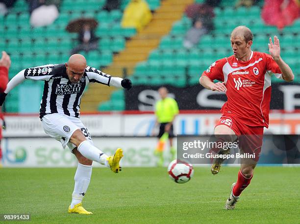 Massimo Maccarone of Siena and Andrea Masiello of Bari in action during the Serie A match between AC Siena and AS Bari at Stadio Artemio Franchi on...