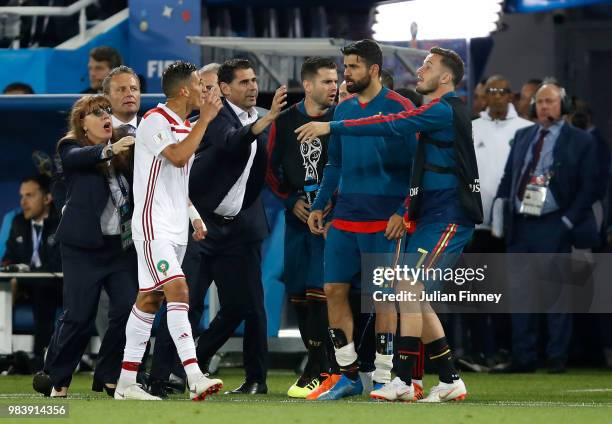 Faycal Fajr of Morocco and Diego Costa of Spain reacts to the VAR decision for the equalising goal to make it 2-2 during the 2018 FIFA World Cup...