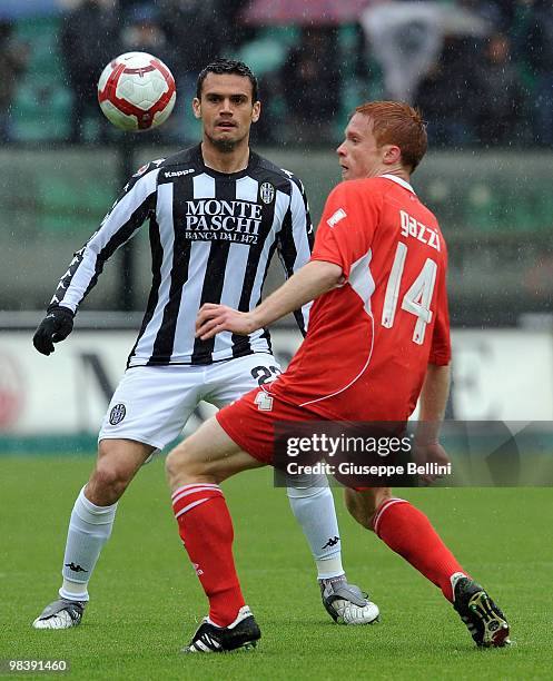 Alexandros Tziolis of Siena and Alessandro Gazzi of Bari in action during the Serie A match between AC Siena and AS Bari at Stadio Artemio Franchi on...