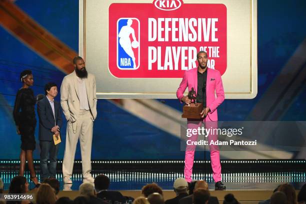 Rudy Gobert of the Utah Jazz accepts the award for Defensive Player of the Year during the 2018 NBA Awards Show on June 25, 2018 at The Barkar Hangar...
