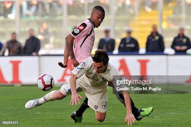 Abel Hernandez of Palermo and Simone Bentivoglio of Chievo compete for the ball during the Serie A match between US Citta di Palermo and AC Chievo...