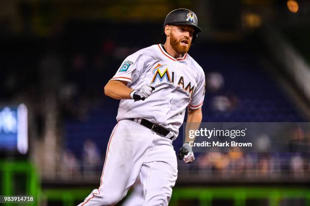 Dan Straily of the Miami Marlins rounds third for the score in the fourth inning during the game against the Arizona Diamondbacks at Marlins Park on...