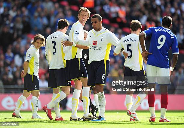 Tom Huddlestone and Peter Crouch of Tottenham Hotspur of Tottenham Hotspur line up in a wall during the FA Cup sponsored by E.ON Semi Final match...