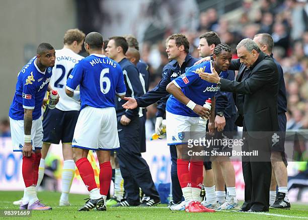 Portsmouth manager Avram Grant advises Frederic Piquionne of Portsmouth during the FA Cup sponsored by E.ON Semi Final match between Tottenham...