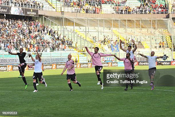 Players of Palermo celebrate after winning the Serie A match between US Citta di Palermo and AC Chievo Verona at Stadio Renzo Barbera on April 11,...
