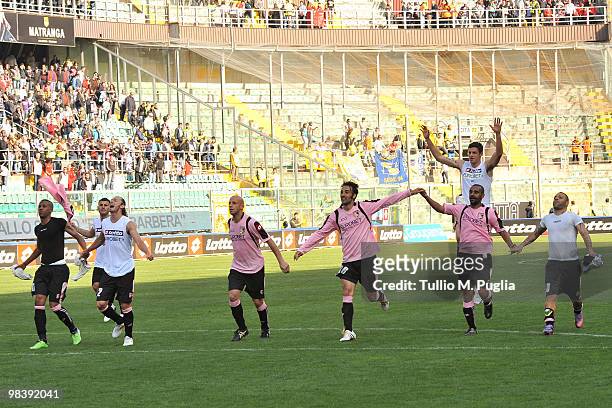 Players of Palermo celebrate after winning the Serie A match between US Citta di Palermo and AC Chievo Verona at Stadio Renzo Barbera on April 11,...