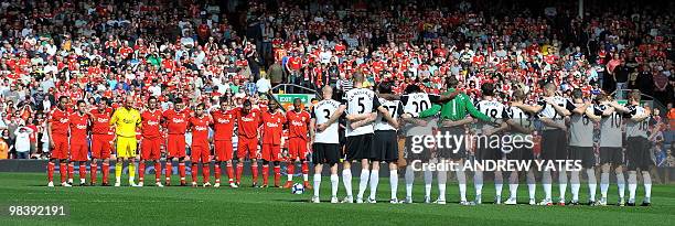 Liverpool and Fulham plays stand for one minute in memory of the 96 fans killed in the Hillsborough disaster before the English Premier League...